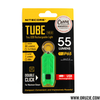 NITECORE Tube V2.0 LED keychain light with USB charging port, displayed on its packaging which is predominantly yellow and black with additional product information.