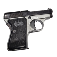 Beretta 418 kalibra 6,35 mm Browning iz 1957. godine, leva strana pištolja sa originalnim Beretta oblogama drške, italijanski džepni pištolj poznat kao prvi pištolj Jamesa Bonda.